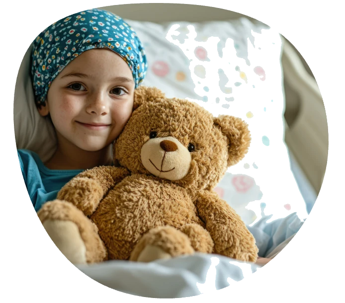 girl holding a teddy bear